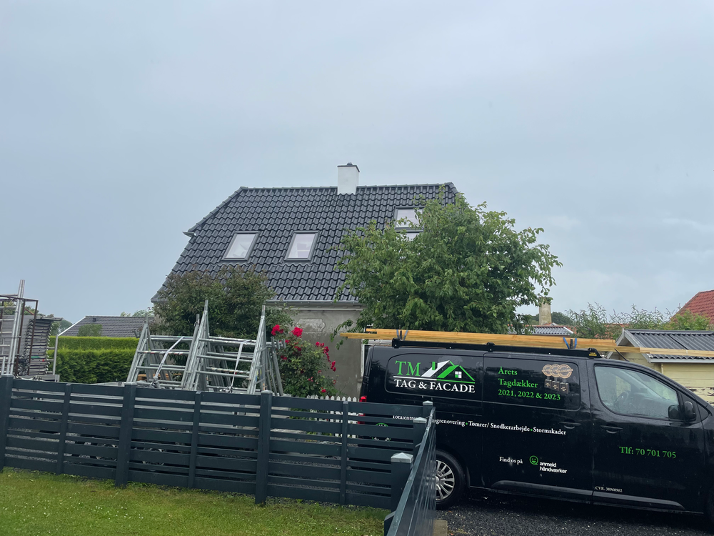 TM Tag og Facade ApS logo